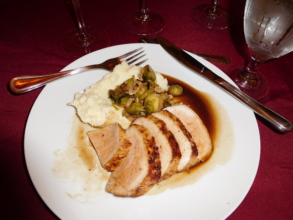 Pork tenderloin with smoked potatoes and caramelized brussel sprouts with bacon