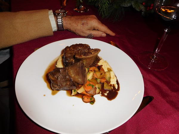 Beef short ribs with creamy polenta and roasted root vegetables