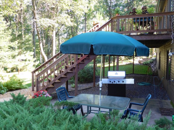 Grill-side dining, just steps from the screen house.