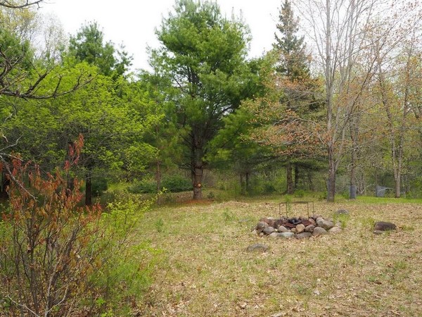 Fire pit in yard of Century 21 property