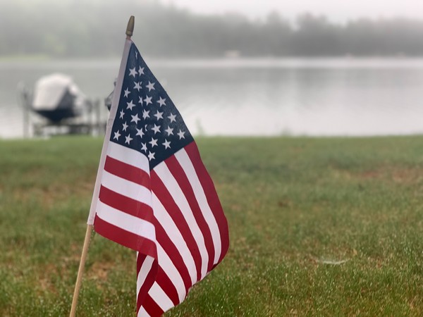 Close up of American flag near a Wisconsin lake