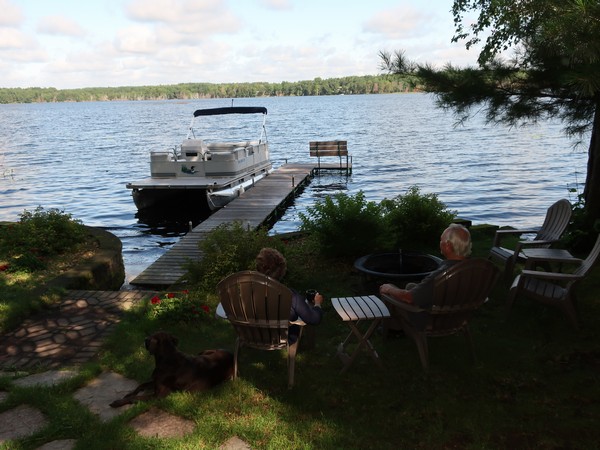 The Millers sitting by the lake admiring the view