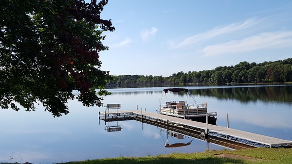 Lake in Northwestern Wisconsin with dock and pontoon