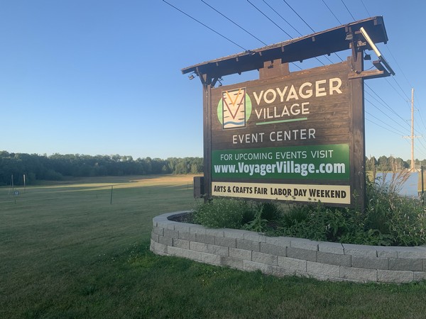 Voyager village event center wood sign