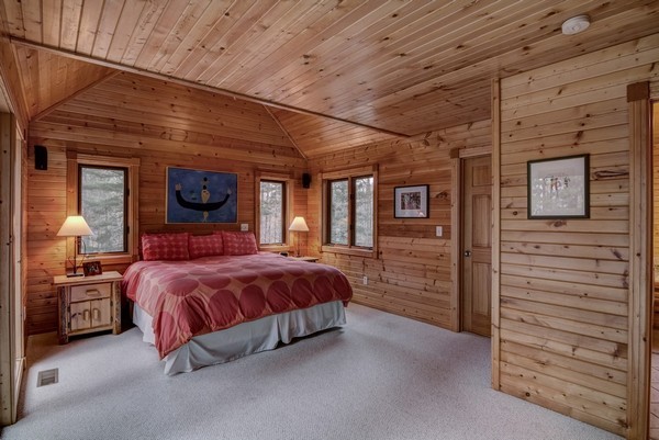 Main floor master suite with walk-in closet, jet tub and private master deck