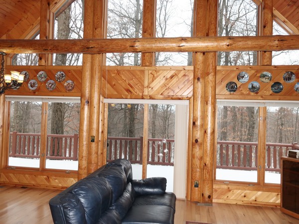 large deck with log railing